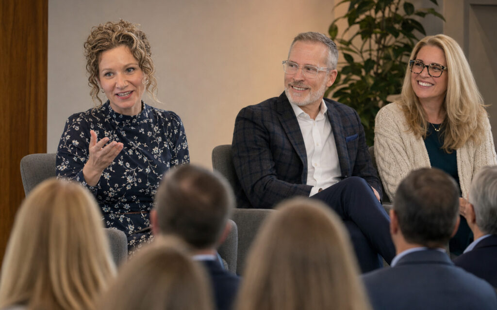 Illustrative scene of CGP principals speaking on a panel at a leadership forum.